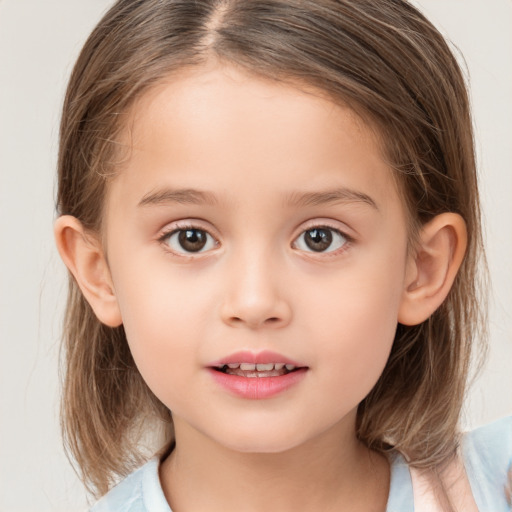 Joyful white child female with medium  brown hair and brown eyes