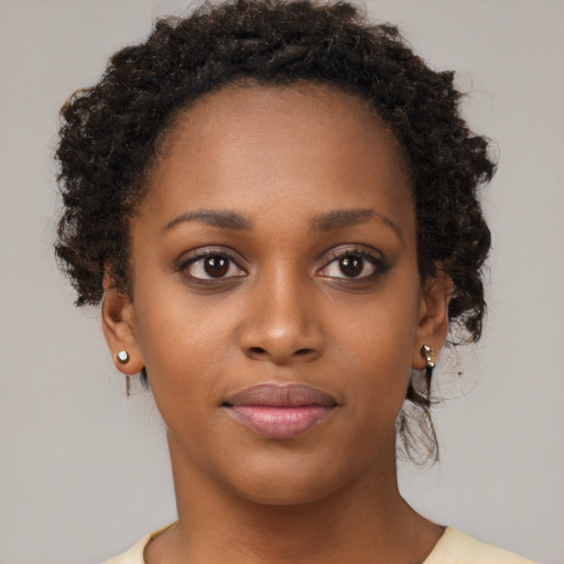 Neutral black young-adult female with short  brown hair and brown eyes