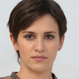 Neutral white young-adult female with short  brown hair and brown eyes