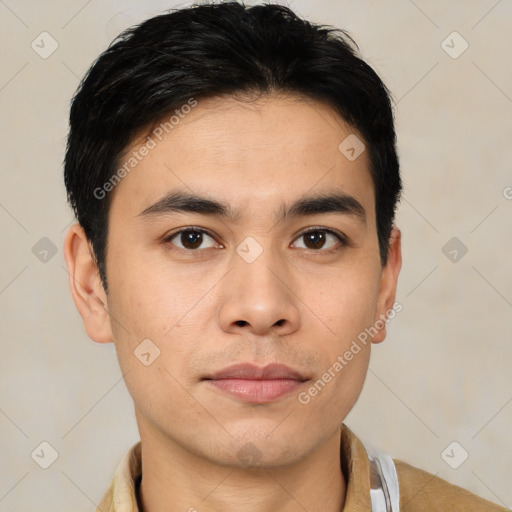 Joyful asian young-adult male with short  brown hair and brown eyes