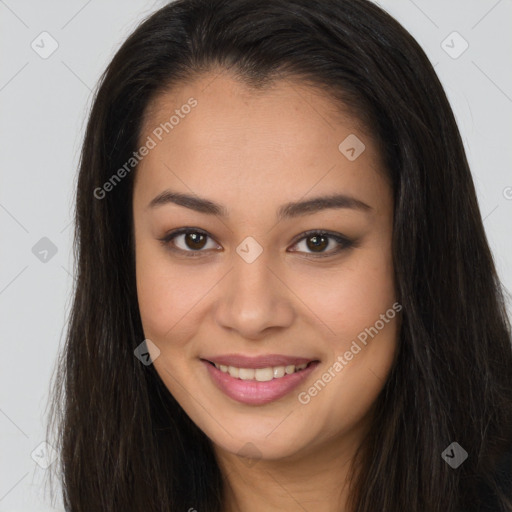 Joyful asian young-adult female with long  brown hair and brown eyes