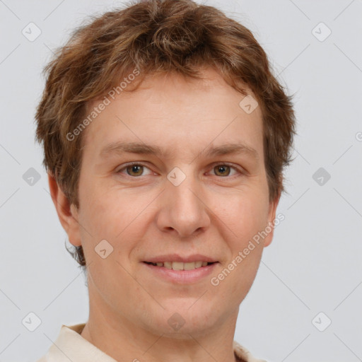 Joyful white adult male with short  brown hair and grey eyes