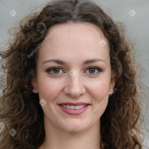 Joyful white young-adult female with long  brown hair and green eyes