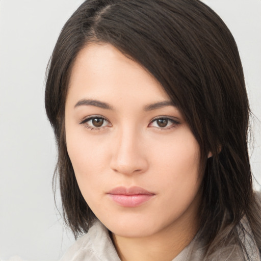 Neutral asian young-adult female with long  brown hair and brown eyes