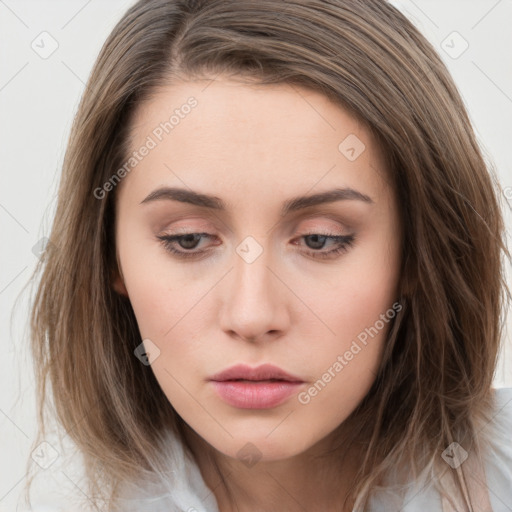 Neutral white young-adult female with long  brown hair and brown eyes