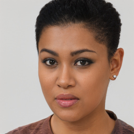 Neutral black young-adult female with short  brown hair and brown eyes