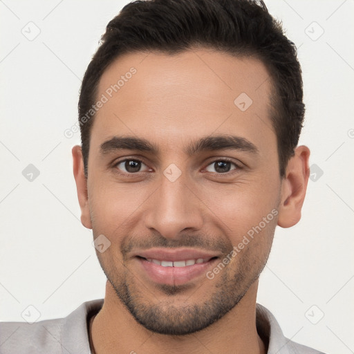 Joyful white young-adult male with short  brown hair and brown eyes