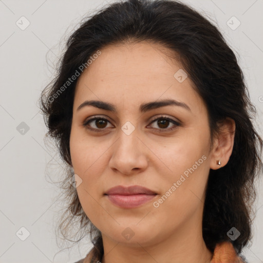 Joyful latino young-adult female with medium  brown hair and brown eyes