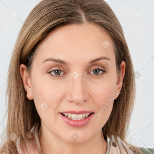 Joyful white young-adult female with long  brown hair and grey eyes