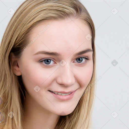 Joyful white young-adult female with long  brown hair and blue eyes