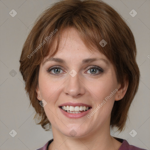 Joyful white young-adult female with medium  brown hair and blue eyes