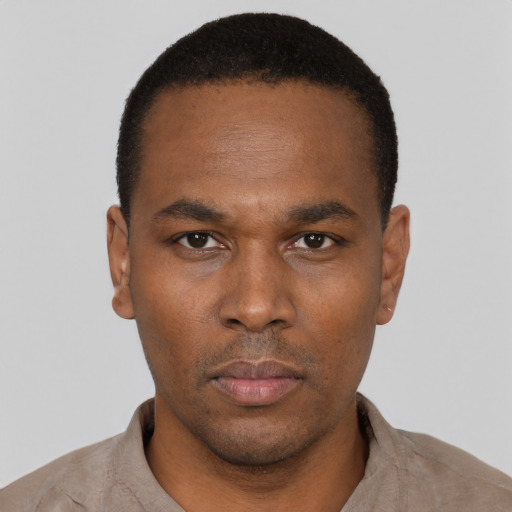 Neutral black young-adult male with short  black hair and brown eyes