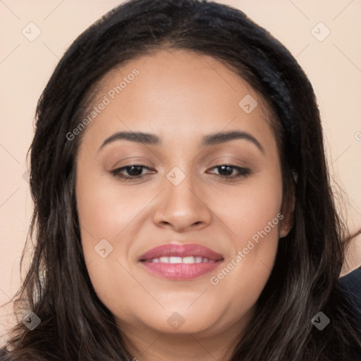 Joyful latino young-adult female with long  brown hair and brown eyes