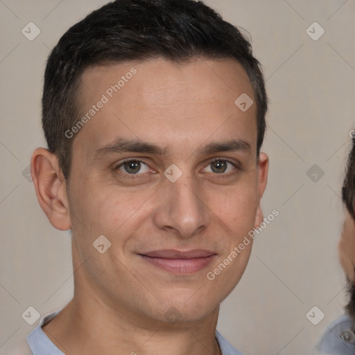 Joyful white young-adult male with short  brown hair and brown eyes