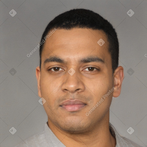 Neutral latino young-adult male with short  black hair and brown eyes