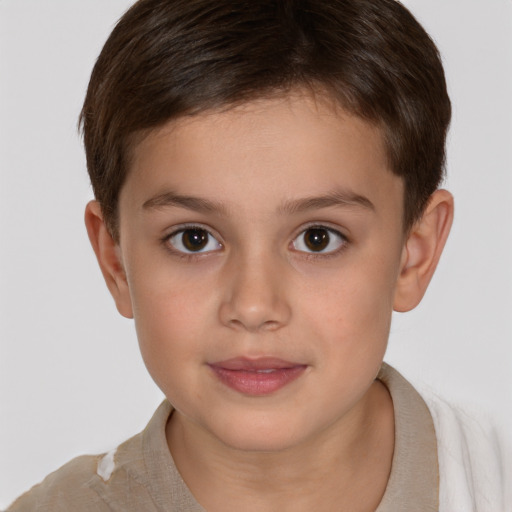 Joyful white child female with short  brown hair and brown eyes