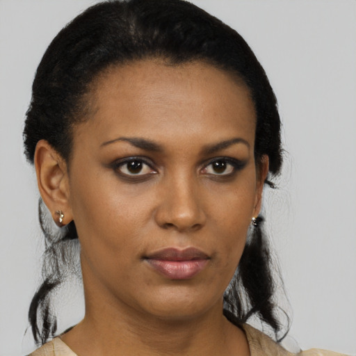 Neutral latino young-adult female with short  brown hair and brown eyes