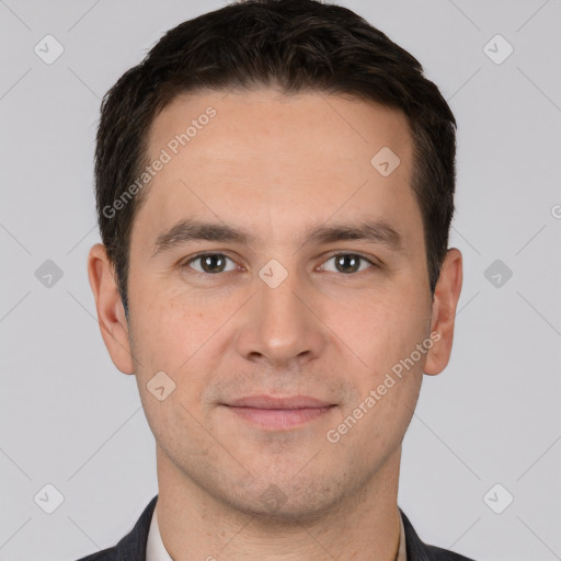 Joyful white young-adult male with short  brown hair and brown eyes