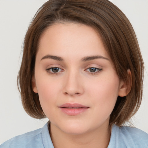 Neutral white young-adult female with medium  brown hair and brown eyes