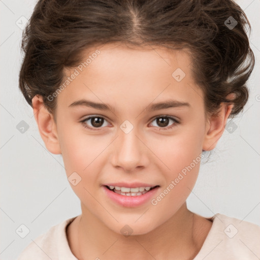 Joyful white child female with short  brown hair and brown eyes