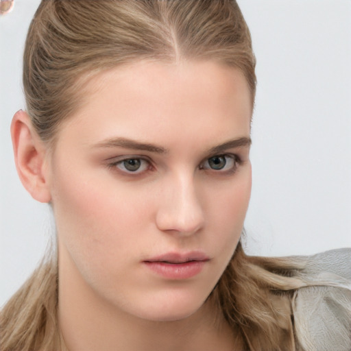 Neutral white young-adult female with long  brown hair and blue eyes