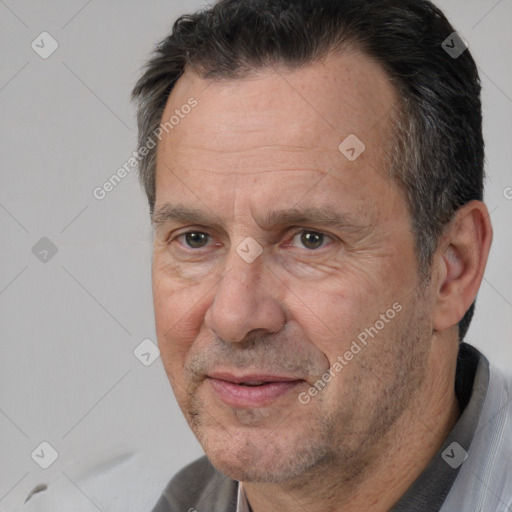 Joyful white middle-aged male with short  brown hair and brown eyes