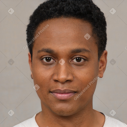 Joyful black young-adult male with short  black hair and brown eyes