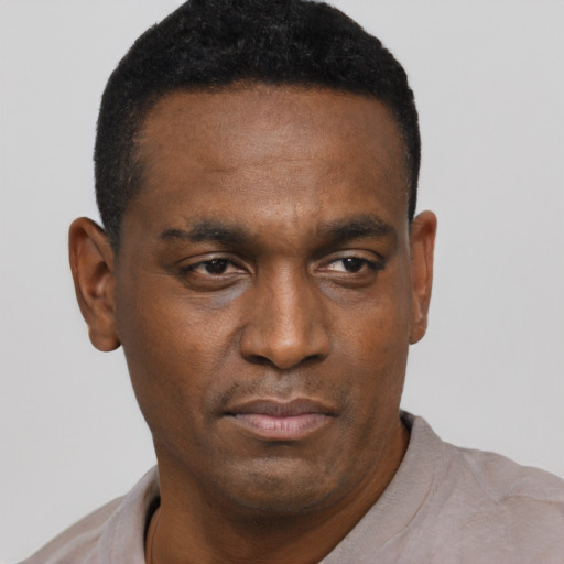Neutral black young-adult male with short  black hair and brown eyes