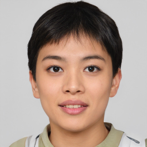 Joyful asian young-adult female with short  black hair and brown eyes