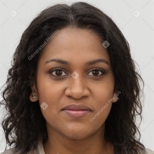 Joyful black young-adult female with long  brown hair and brown eyes