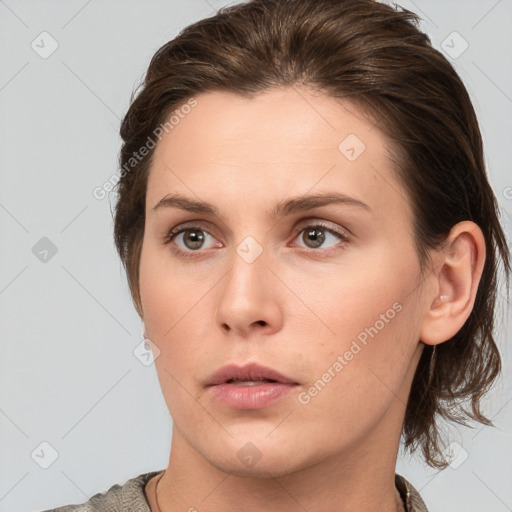 Neutral white young-adult female with medium  brown hair and grey eyes