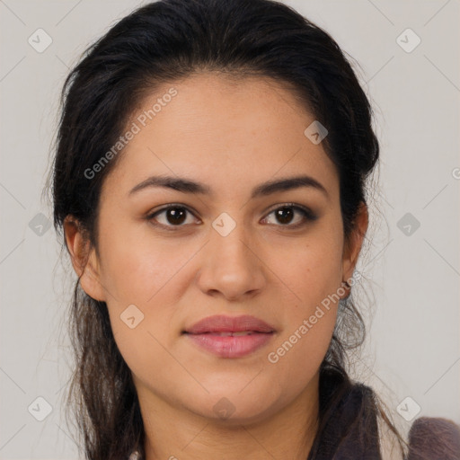 Joyful latino young-adult female with long  brown hair and brown eyes