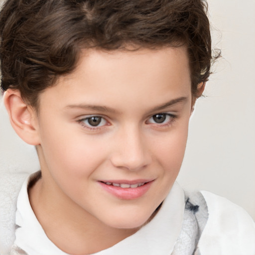 Joyful white child male with short  brown hair and brown eyes