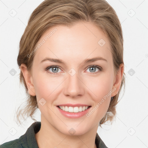 Joyful white young-adult female with medium  brown hair and blue eyes