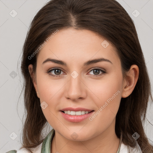 Joyful white young-adult female with medium  brown hair and brown eyes