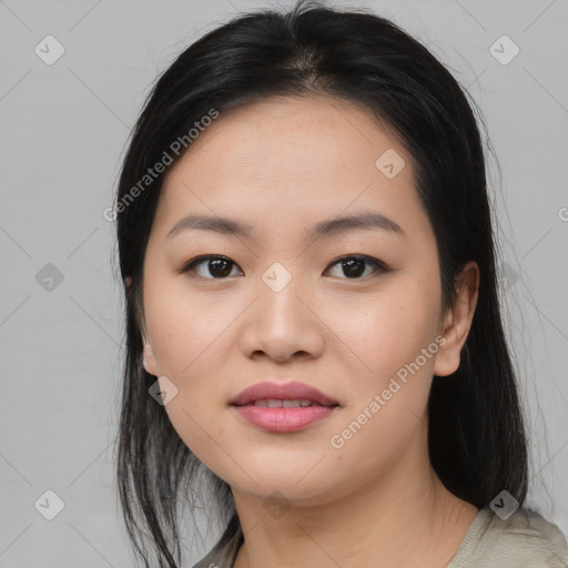 Joyful asian young-adult female with medium  black hair and brown eyes