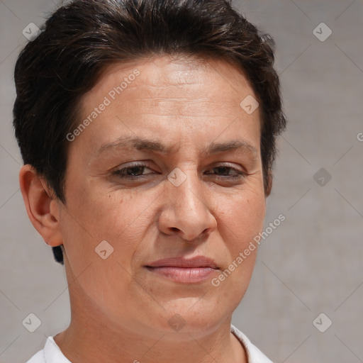 Joyful white adult female with short  brown hair and brown eyes