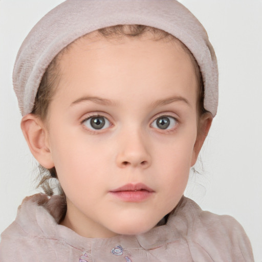 Neutral white child female with short  brown hair and blue eyes