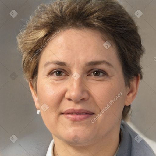 Joyful white adult female with short  brown hair and brown eyes