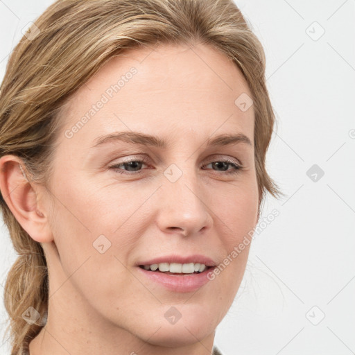 Joyful white young-adult female with long  brown hair and blue eyes