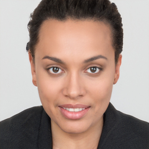 Joyful white young-adult female with short  brown hair and brown eyes