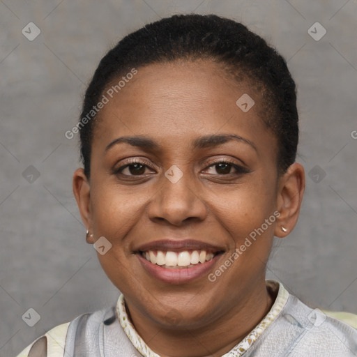 Joyful black young-adult female with short  brown hair and brown eyes