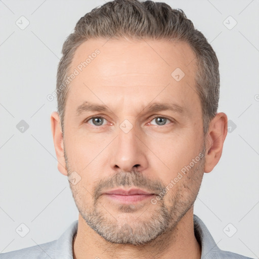 Neutral white adult male with short  brown hair and brown eyes