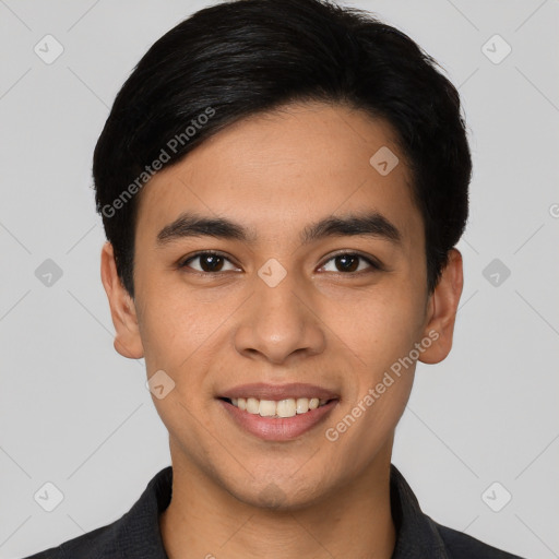 Joyful latino young-adult male with short  black hair and brown eyes