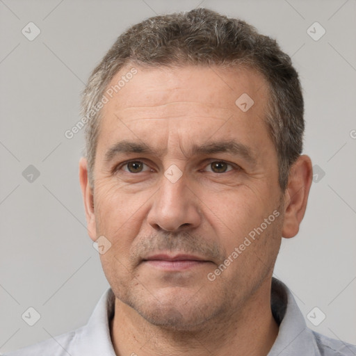 Neutral white adult male with short  brown hair and brown eyes