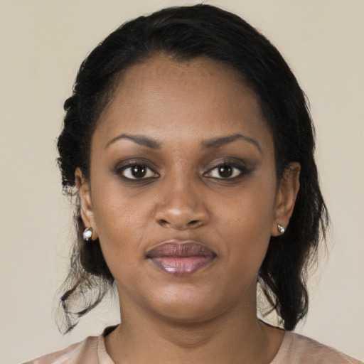 Neutral black young-adult female with medium  black hair and brown eyes