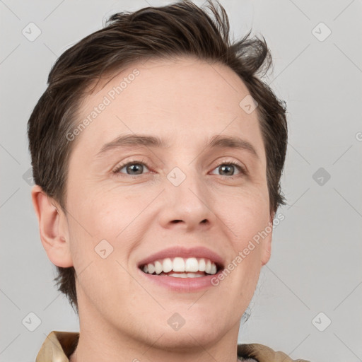 Joyful white young-adult male with medium  brown hair and grey eyes