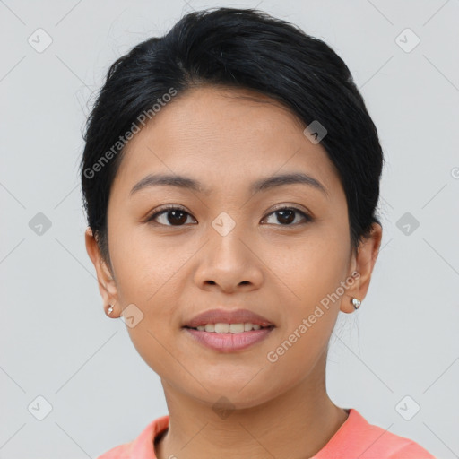 Joyful asian young-adult female with short  black hair and brown eyes