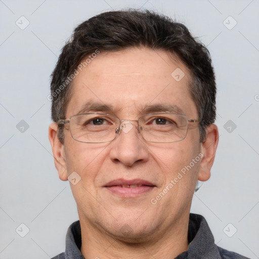 Joyful white middle-aged male with short  brown hair and brown eyes