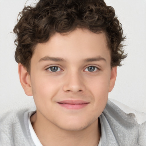 Joyful white child male with short  brown hair and brown eyes